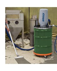 Sand that covers the floor around a sand blaster is quickly vacuumed into the drum using the rugged floor tool.