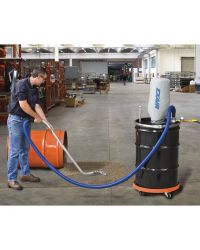 The Heavy Duty Dry Vac cleans up a spill of tumbling media.
