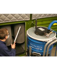 A clogged filtering system for a buffing booth is quickly cleaned and put back into service using the Heavy Duty HEPA Vac.