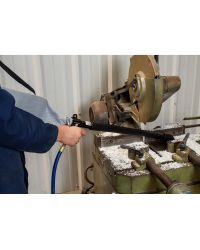 A Vac-u-Gun easily removes chips from a saw cutting process.